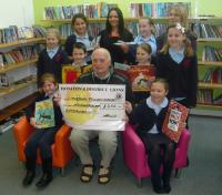 Lion Ron presenting cheque for 250 towards new library