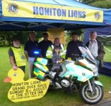 Honiton Lions with Daniel Lavery and Devon Freewheelers New BMW Bike