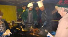 Through the smoke and fire, the Lions chefs work on 
