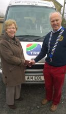 Lion President with TRIP Chairman Val Royle following 500 grant for uniforms