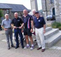 Lion Bill King (far right) joins his son, Divid King as he takes the baton