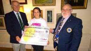 Joy from CLIC Sargent presented with £2000