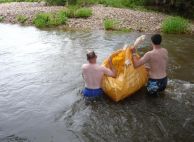 two very brave guys with duck ready to go