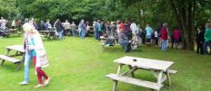 crowds watching duck race home