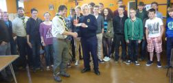Lion Tom presenting the £150 cheque to Scouts