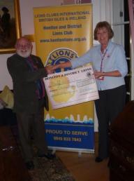 Cheque presentation to Maggie Little from DAAT