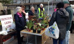 Lions Ladies with their plant stand on a cold but bright day