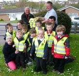 Mill Water School receiving the 30 tabards from Lion Ron Webb