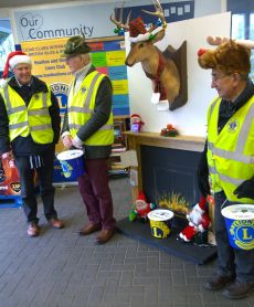 Lions Tom, Bernard and Roy at Tesco collecting at Easter