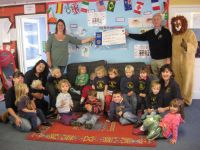 Presentation of cheque for 329 pounds to Upottery Preschool