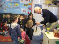 Lion Ed speaking with Mrs Bright and children