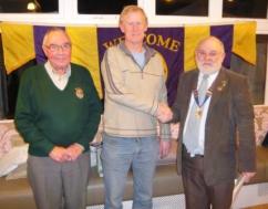 Lion President Brian and Lion Bill welcome Trevor to the club